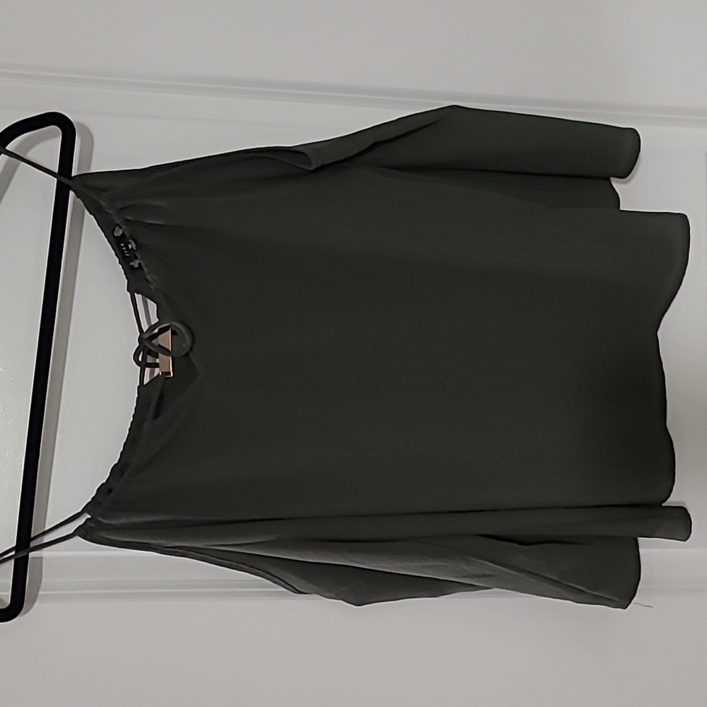 Open shoulder green blouse
